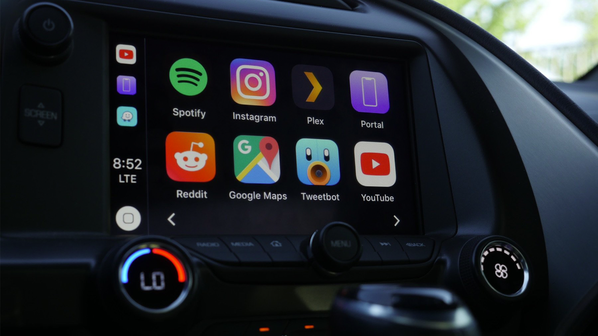 A CarPlay home screen with many apps including Instagram, Plex, Reddit, Tweetbot, and YouTube.